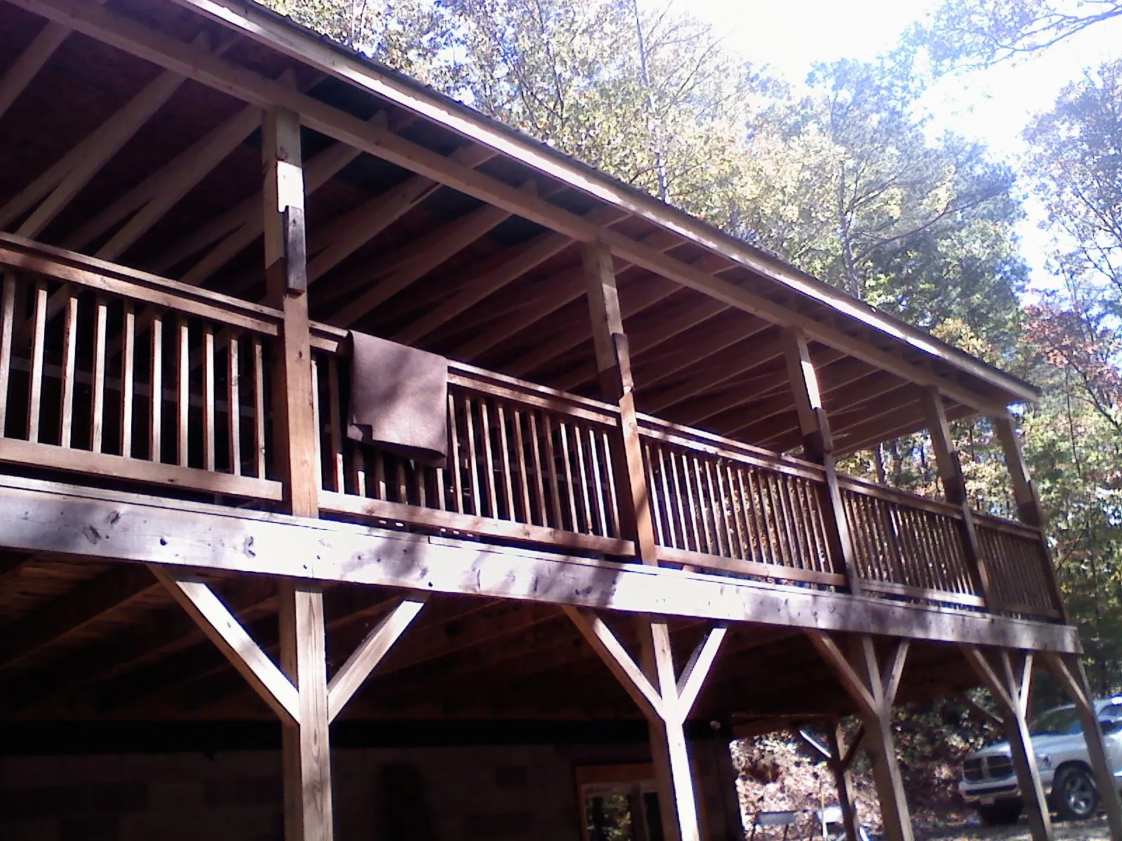 Timber framing under a new elevated porch and deck — Roof Leak Repair in Kiln by Roofing Brothers